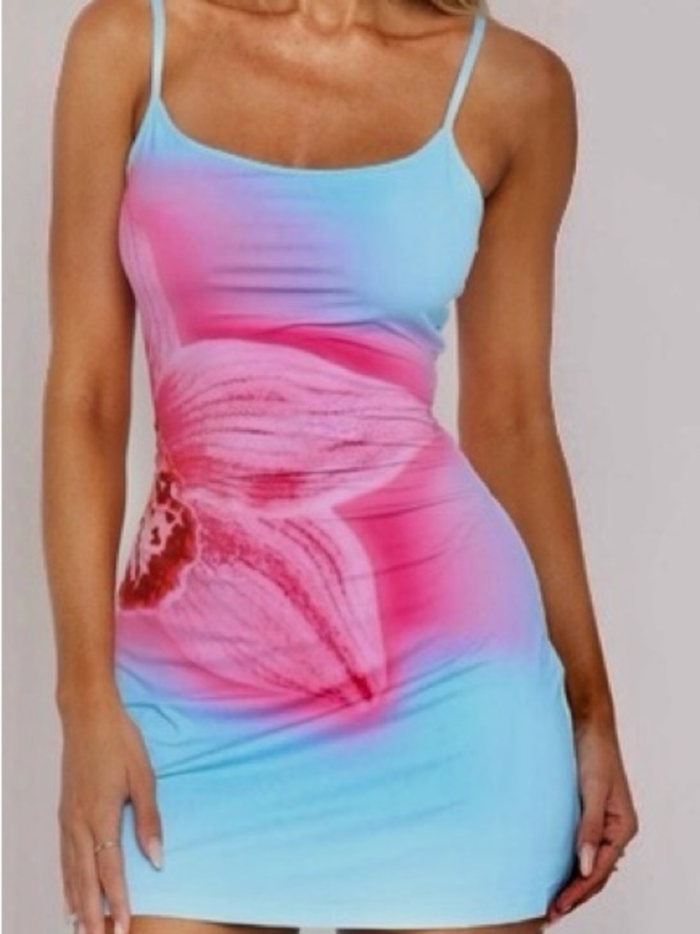 Pink and blue gradient mini dress with abstract floral design